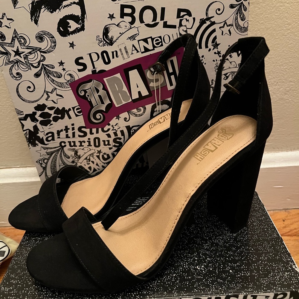 Women’s black strap heels